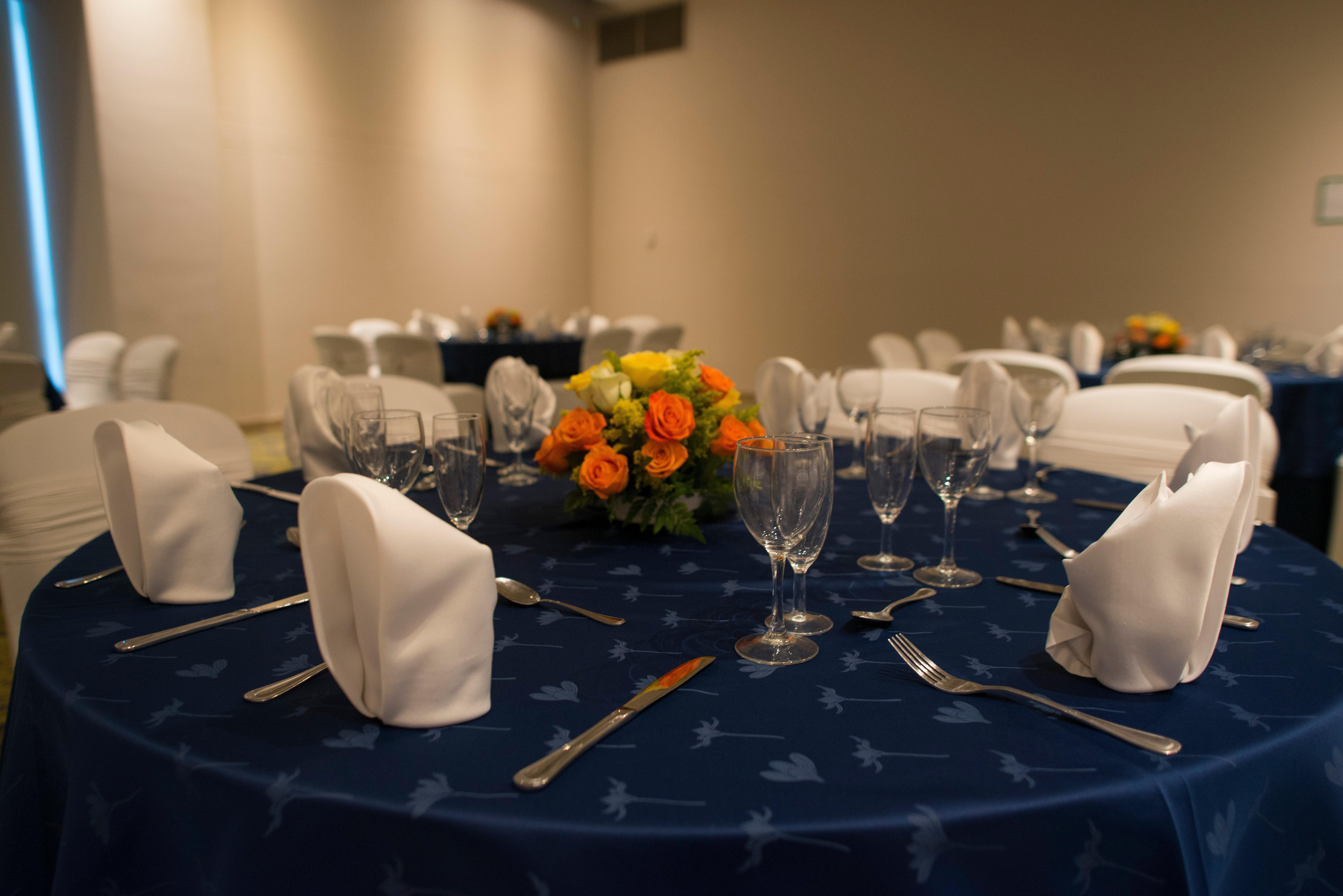 Holiday Inn Cucuta By Ihg Dış mekan fotoğraf A table set for a formal dinner